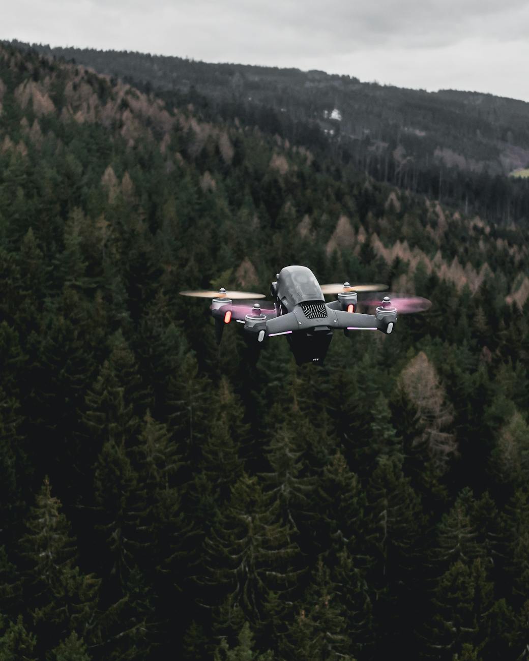 drone flying over a forest